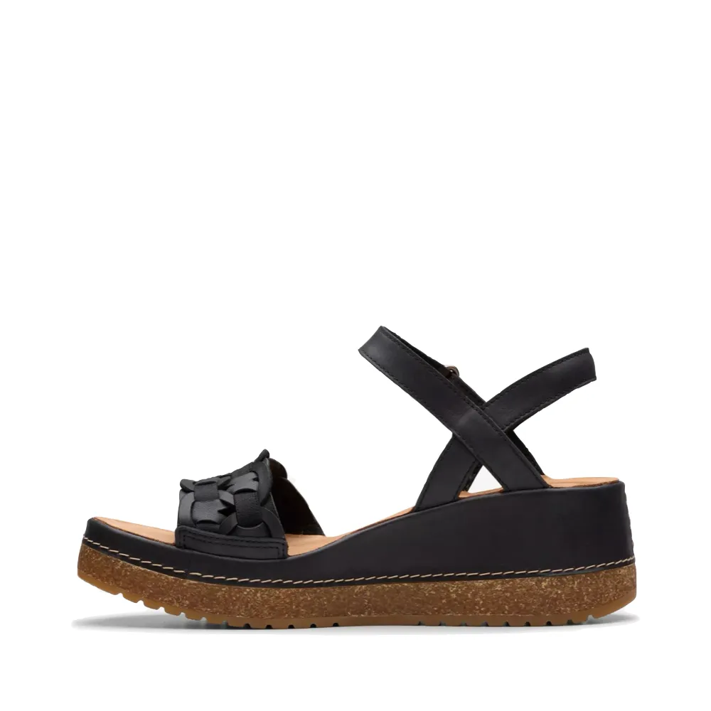 Clarks Women's Kassanda Bar Wedge Sandal in Black