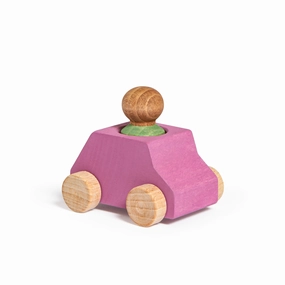 Pink wooden car with green figure