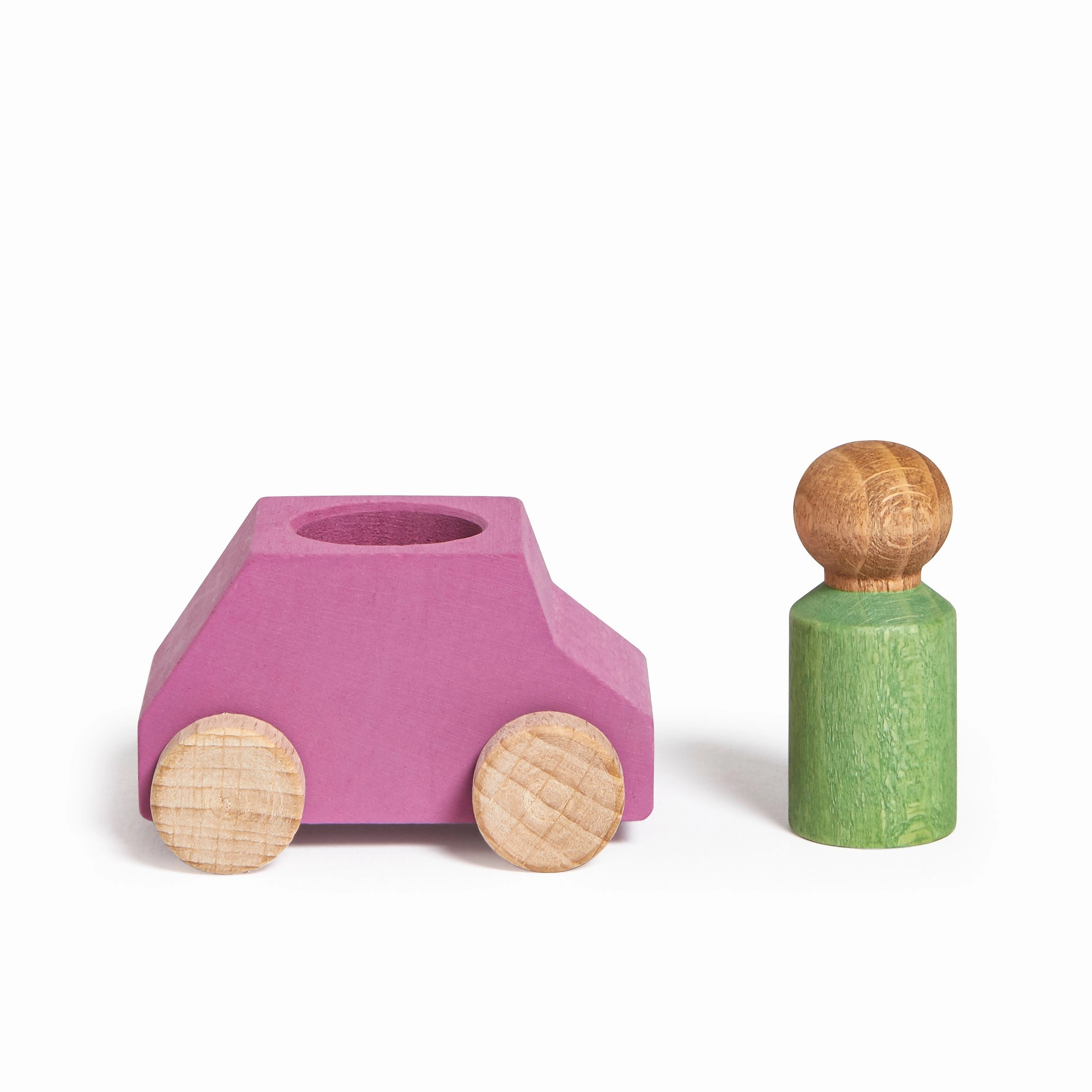 Pink wooden car with green figure